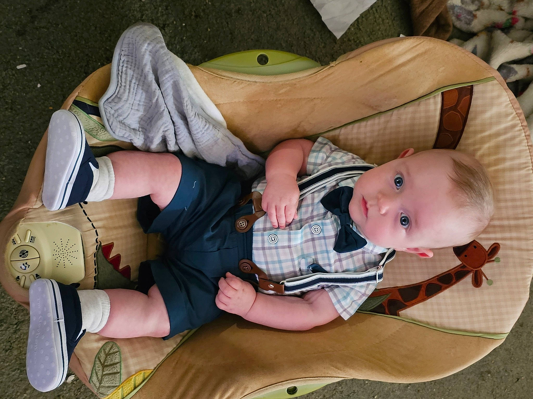 Gavin joined the competition — help win amazing prizes! baby, baby_products, baby_toddler_clothing, carmine, child, comfort, fashion_accessory, foot, grass, green, human_body, human_leg, knee, lap, pattern, person, sitting, sock, thigh, toddler