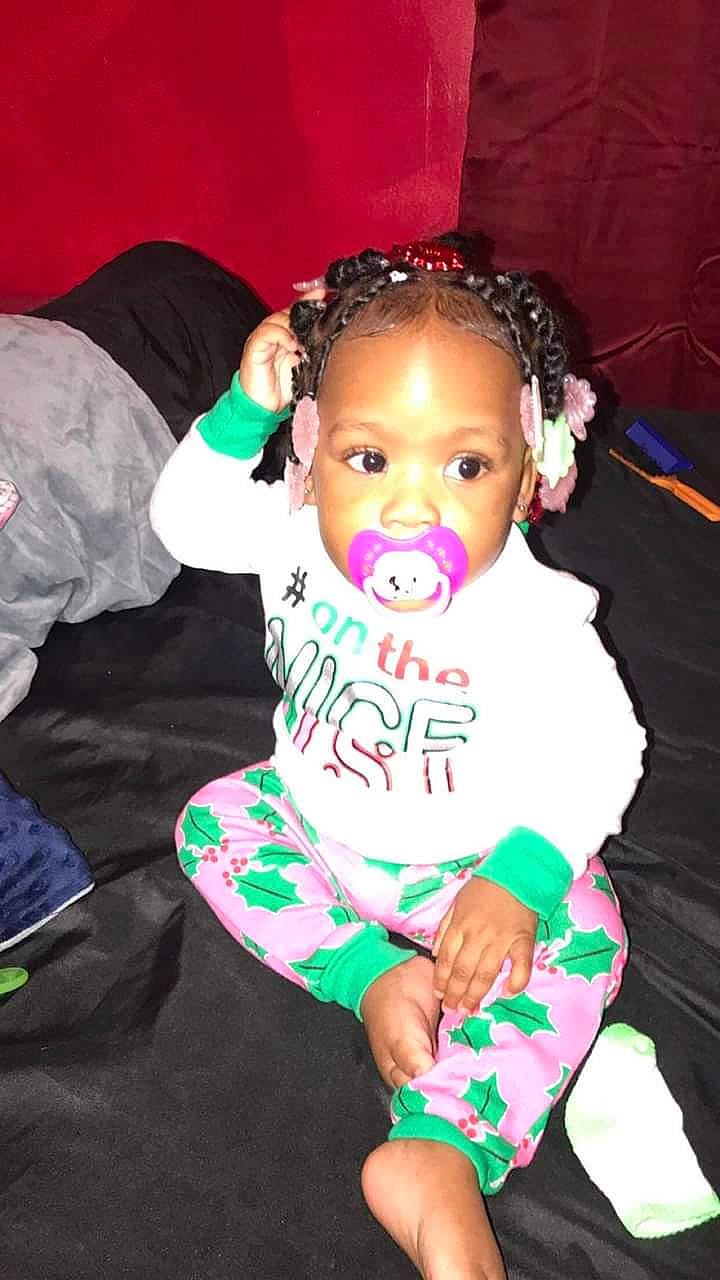 Ashanti is registered to the contest to win money with this photo: baby, child, person, toddler