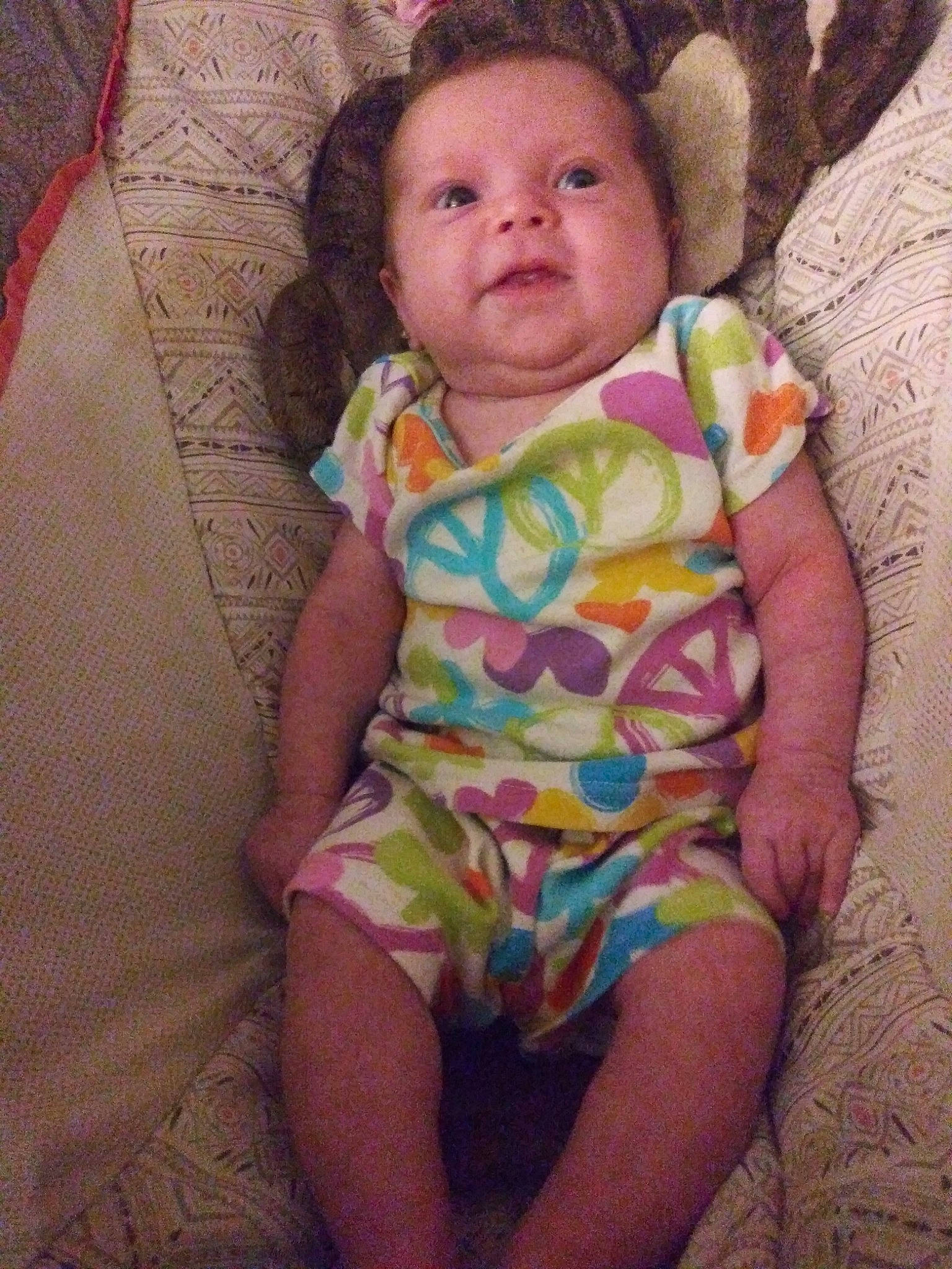 Izabella is registered to the contest to win money with this photo: baby, baby_products, baby_toddler_clothing, cheek, child, diaper, eye, face, head, iris, person, product, sitting, skin, smile, toddler