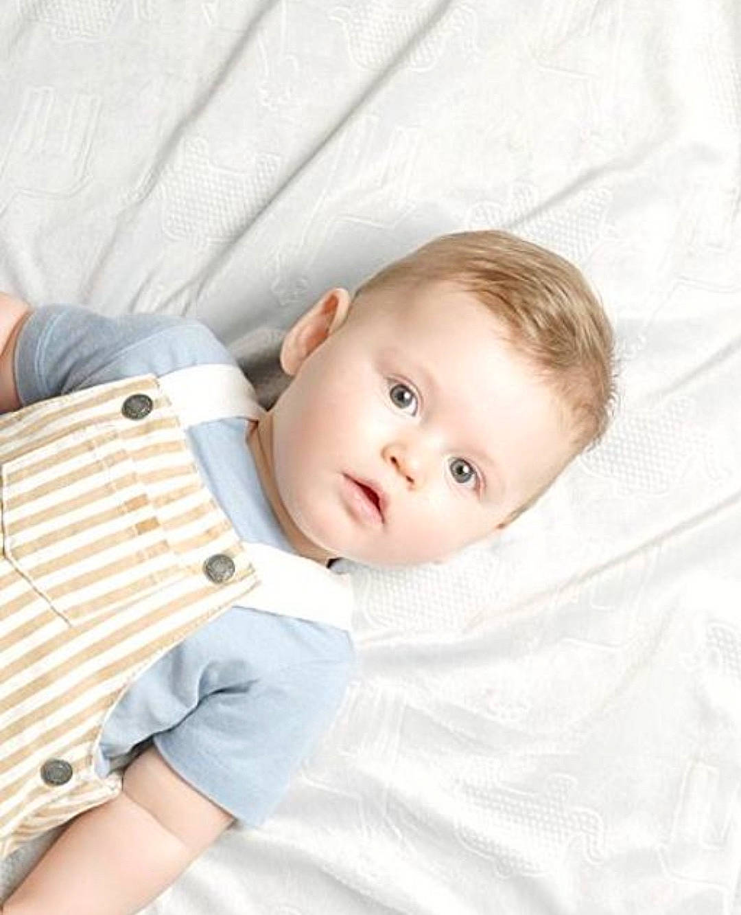 Waylon is registered to the contest to win money with this photo: baby, baby_products, baby_sleeping, baby_toddler_clothing, cheek, child, collar, comfort, dress_shirt, face, linens, pattern, person, plaid, sitting, skin, sleeve, textile, toddler, vertebrate