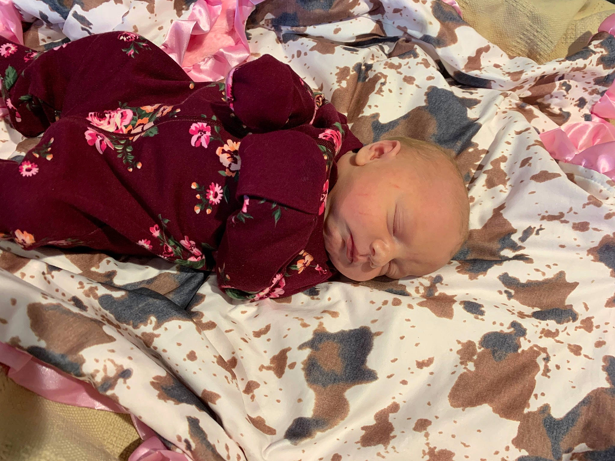 Oakley is registered to the contest to win money with this photo: baby, baby_products, baby_toddler_clothing, brown, carmine, child, comfort, deciduous, flooring, grass, leaf, linens, military_camouflage, pattern, people_in_nature, person, sleep, soil, textile, toddler