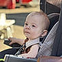 Basile participe au concours pour gagner de l'argent avec cette photo : baby, baby_boy, casual, chicco, child, child_safety, closeup, daylight, expression, face, infant, outdoor, person, portrait, relaxed, seat, seatbelt, stroller, sunlight, young_child