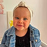 baby, baby_fashion, black_shirt, blue_eyes, child, clothing, cute, denim_jacket, face, happy, headband, indoor, person, pink, portrait, sitting, smile, soft_light, toddler, wall_art