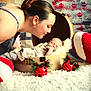 Nino participe au concours pour gagner de l'argent avec cette photo : affection, baby, christmas_tree, cozy, cute, decorations, family, festive, holiday, indoor, love, ornaments, pacifier, portrait, red_bells, sleeping, suitcase, tender_moment, white_rug, woman