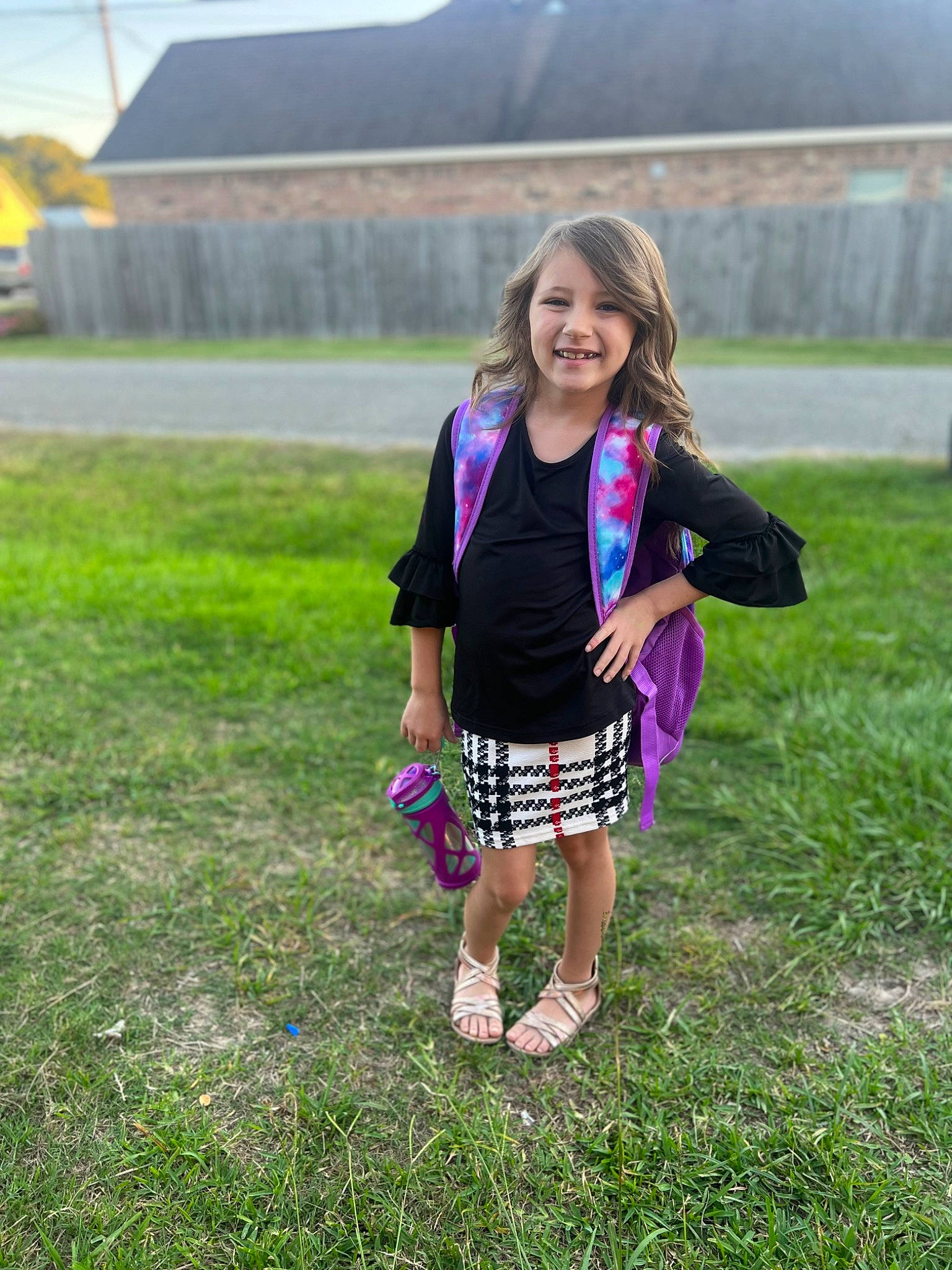 Aryannah joined the competition — help win amazing prizes! boot, child, electric_blue, fun, grass, grassland, happy, joy, landscape, leisure, magenta, pasture, pattern, people_in_nature, person, prairie, recreation, sandal, sky, smile