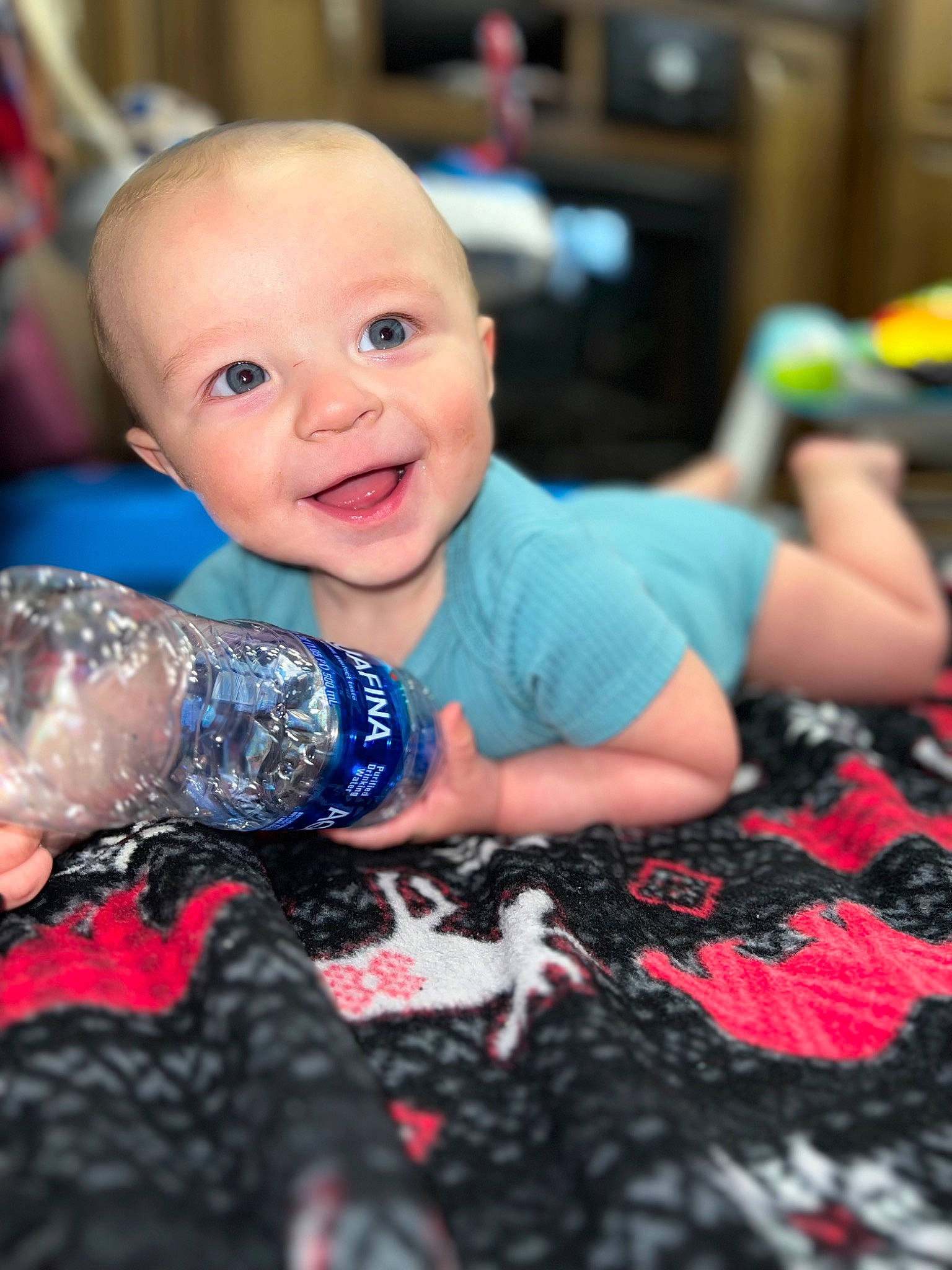 Wyatt joined the competition — help win amazing prizes! baby, carmine, child, electric_blue, event, finger, flash_photography, flooring, fun, happy, human, nail, party, pattern, people, person, play, sitting, smile, t_shirt