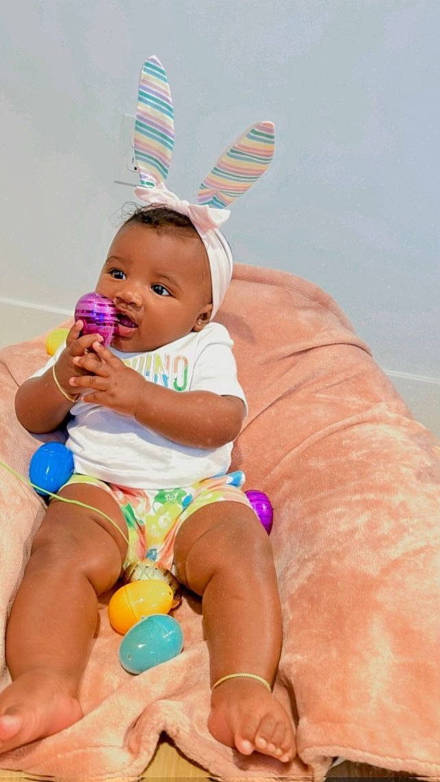 Jermany joined the competition — help win amazing prizes! abdomen, baby, baby_toddler_clothing, child, event, foot, fun, happy, hat, human_body, human_leg, leisure, navel, person, pink, sitting, stomach, thigh, toddler, trunk