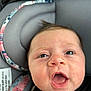 Raelynn is registered to the contest to win money with this photo: baby, face, mouth_open, car_seat, child, infant, closeup, expression, seatbelt, head_support, pink, floral_pattern, blue_eyes, skin, clothing, straps, car_interior, seat, young_child, portrait
