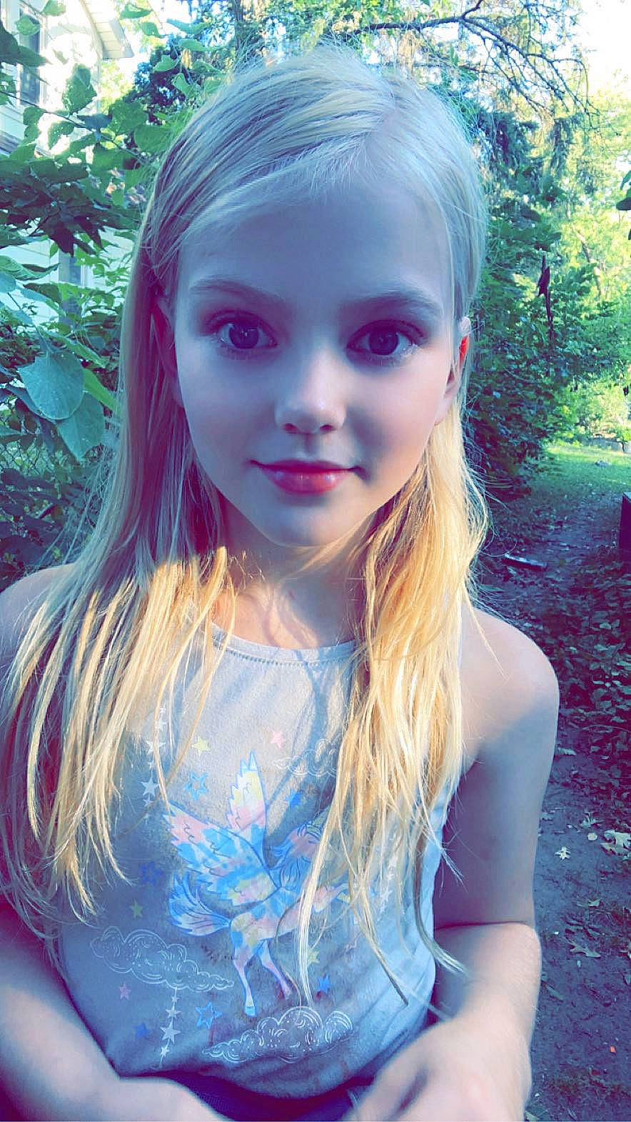 Talyah is registered to the contest to win money with this photo: barbie, blond, brown_hair, cool, doll, electric_blue, eyelash, flash_photography, grass, happy, joy, layered_hair, lip, long_hair, magenta, people_in_nature, person, plant, sunlight, surfer_hair