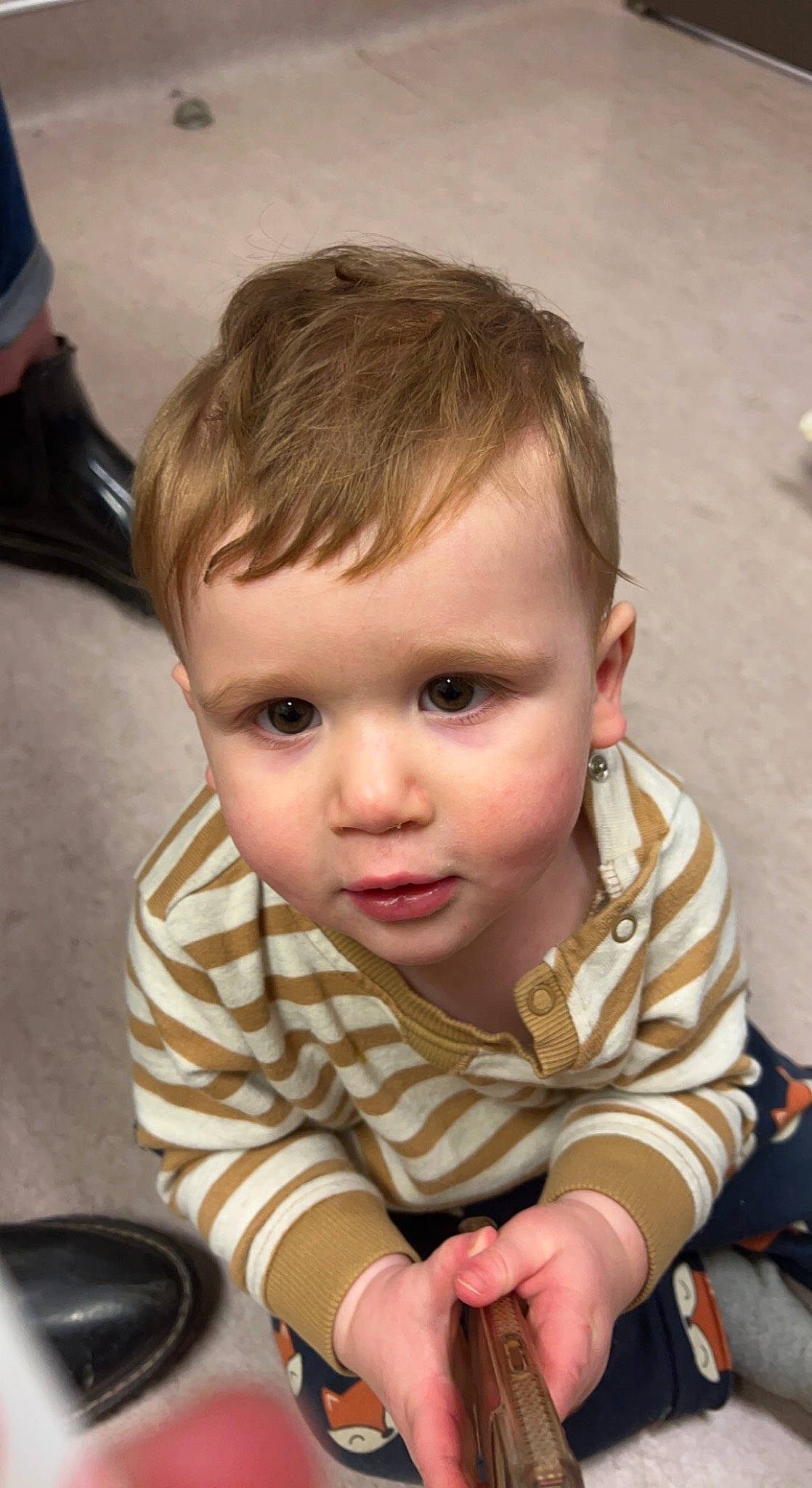 Olivier joined the competition — help win amazing prizes! audio_equipment, baby, baby_toddler_clothing, blond, cheek, child, eye, face, flooring, fun, happy, head, iris, nose, peripheral, person, sitting, skin, sleeve, toddler