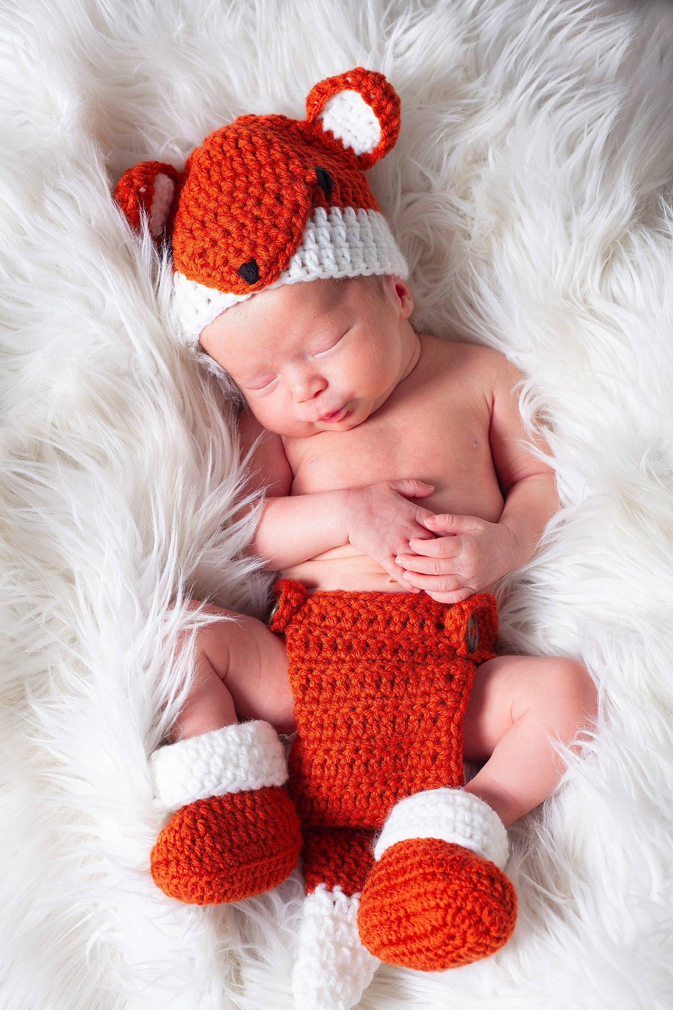 Sylas joined the competition — help win amazing prizes! arm, baby, baby_sleeping, baby_toddler_clothing, cap, child, comfort, finger, hair_accessory, hand, happy, headgear, headwear, knit_cap, linens, person, pink, red, skin, textile