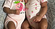 Hope And Faith joined the competition — help win amazing prizes! baby, sleeping, infant, onesie, patterned_clothing, cushion, sleep, peaceful, cute, child, toddler, indoor, rest, matching_outfits, pink_clothing, newborn, portrait, closeup, family, adorable
