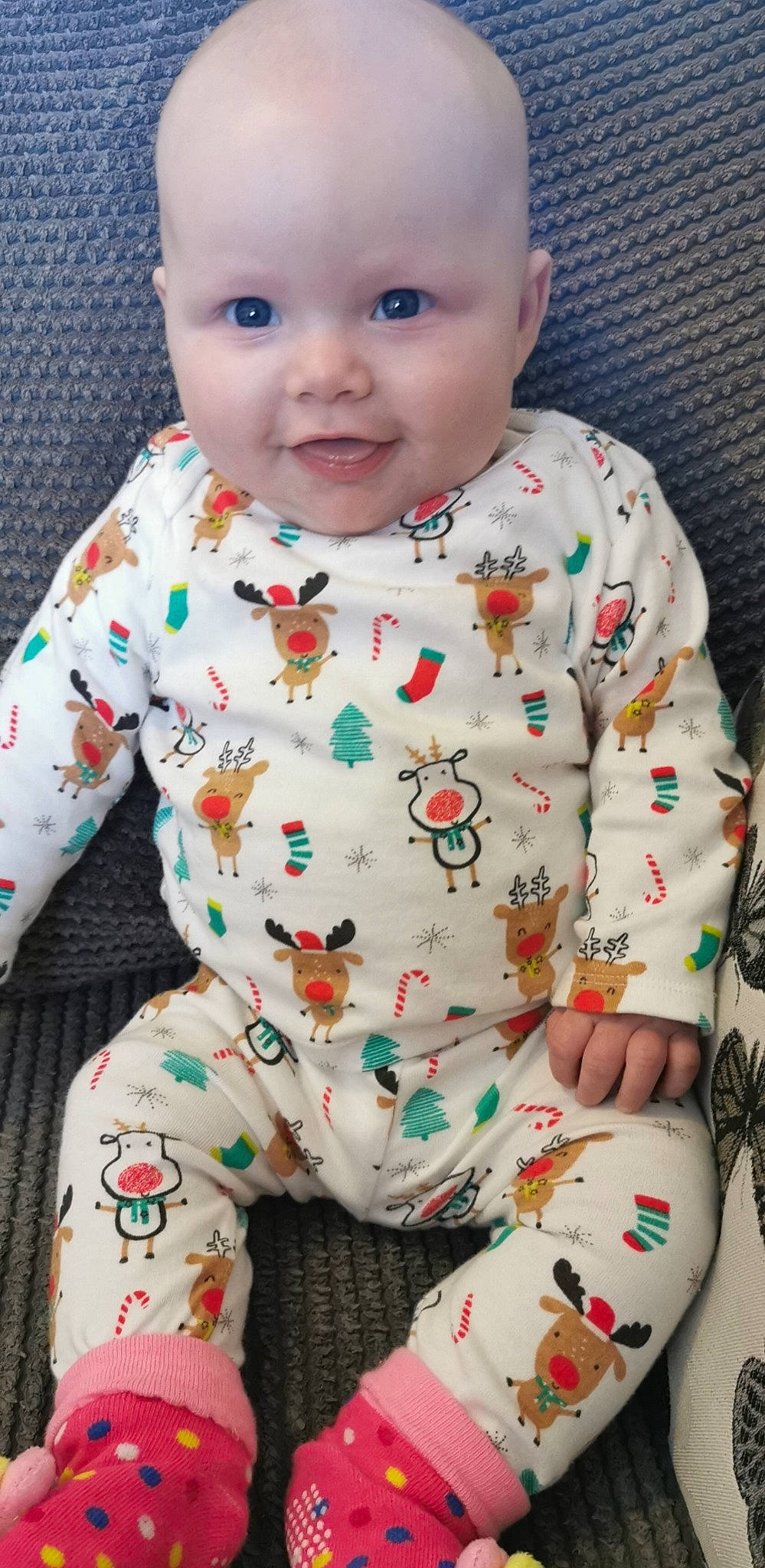 Amelia-mae is registered to the contest to win money with this photo: baby, baby_products, baby_toddler_clothing, cheek, child, infant_bodysuit, pajamas, person, sitting, sleeve, toddler