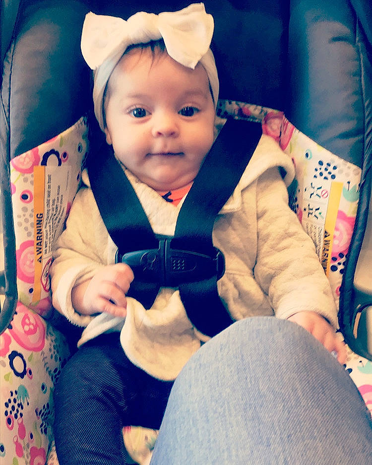 Sally joined the competition — help win amazing prizes! arm, baby, baby_carriage, baby_toddler_clothing, blue, cap, child, comfort, cool, electric_blue, eye, happy, human_body, outerwear, person, plant, sitting, sleeve, smile, suit