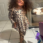 Sapphirerose joined the competition — help win amazing prizes! child, toddler, smiling, portrait, indoor, standing, dress, leopard_print, leggings, shoes, curly_hair, fashion, dog, chair, furniture, tile_floor, home, playroom, pet, happy