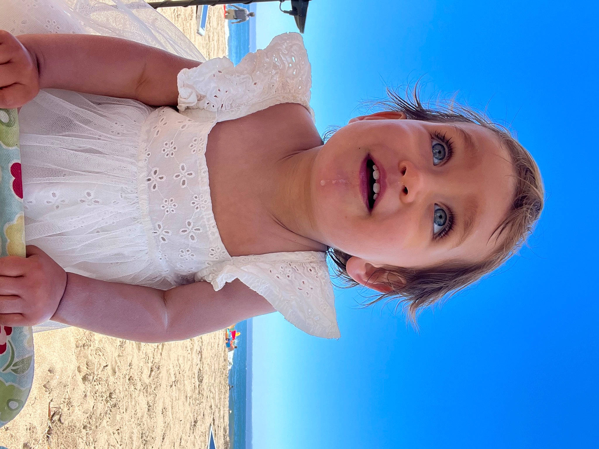 Ariana joined the competition — help win amazing prizes! azure, beach, beauty, chest, child, dress, elbow, electric_blue, flash_photography, fun, happy, leisure, light, person, skin, sky, smile, surprise, thigh, toddler