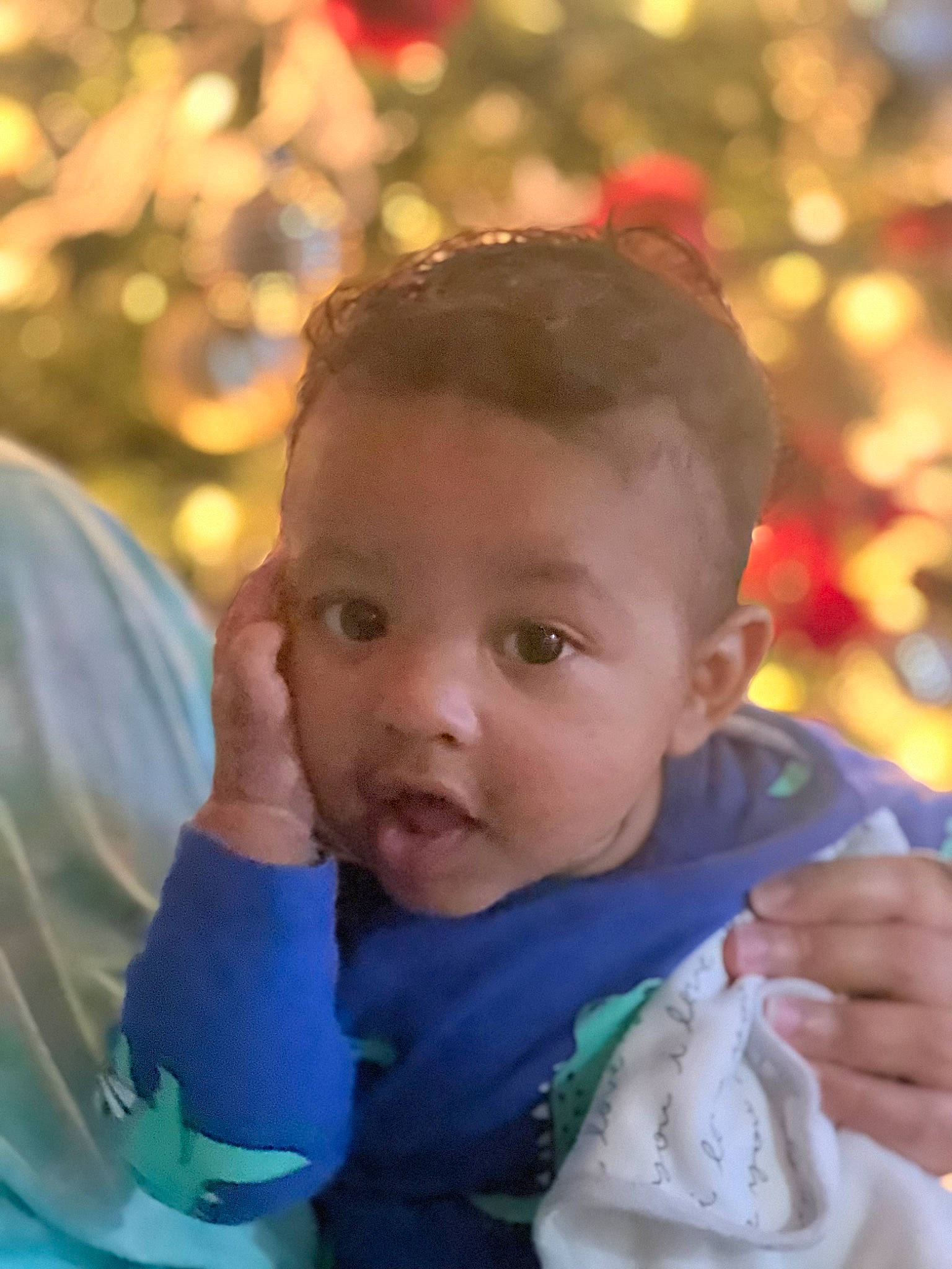 Ezra De Carvalho is registered to the contest to win money with this photo: baby, cheek, child, event, eye, fun, gesture, grass, happy, human_body, iris, leisure, people_in_nature, person, play, recreation, sitting, toddler, tradition, tree