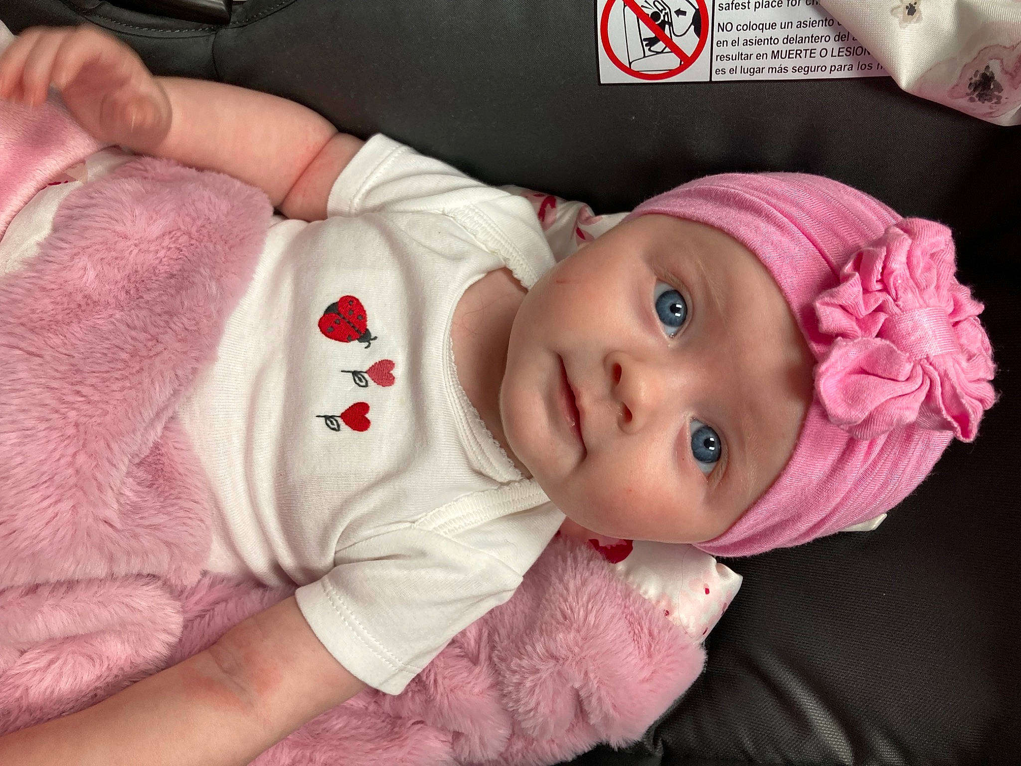 Alice joined the competition — help win amazing prizes! baby, baby_products, baby_toddler_clothing, cap, cheek, child, comfort, eye, eyelash, fashion_accessory, happy, hat, headwear, lip, magenta, mouth, nose, person, pink, skin