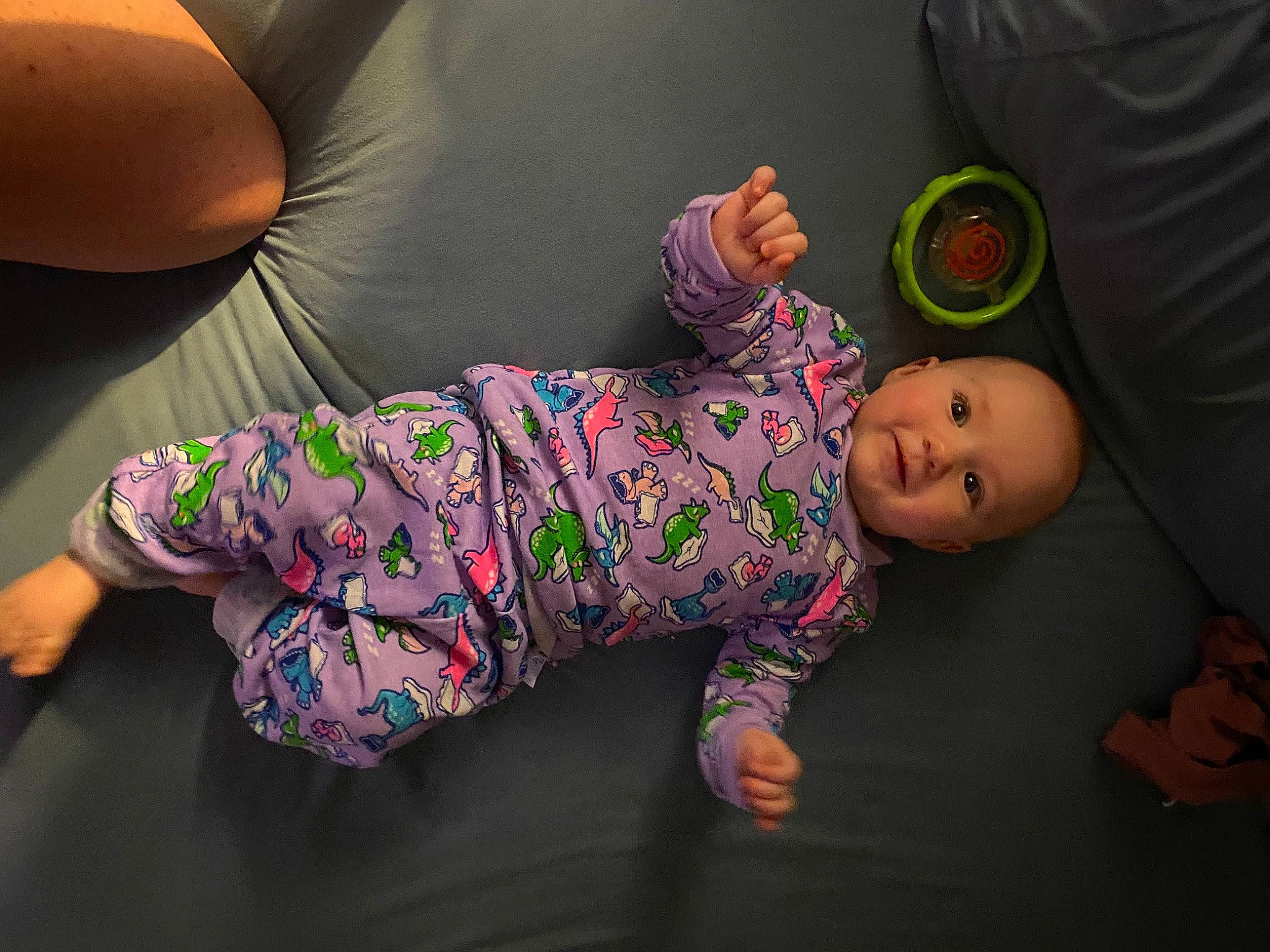 Andromeda is registered to the contest to win money with this photo: baby, baby_toddler_clothing, cheek, child, comfort, flooring, foot, happy, human_body, human_leg, joint, knee, leg, person, sitting, skin, sleeve, sock, t_shirt, thigh