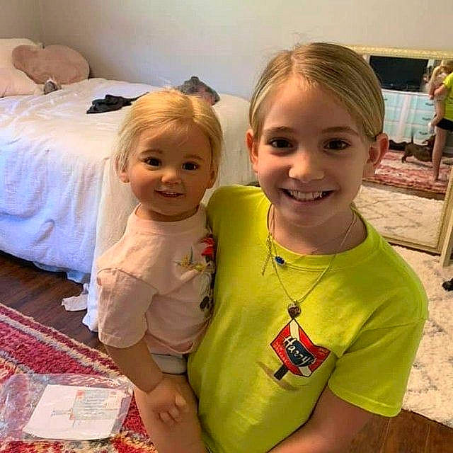 Covidleigh And Iris is registered to the contest to win money with this photo: baby, blond, child, ear, eye, face, fun, happy, head, joy, people, person, play, selfie, sibling, smile, t_shirt, toddler