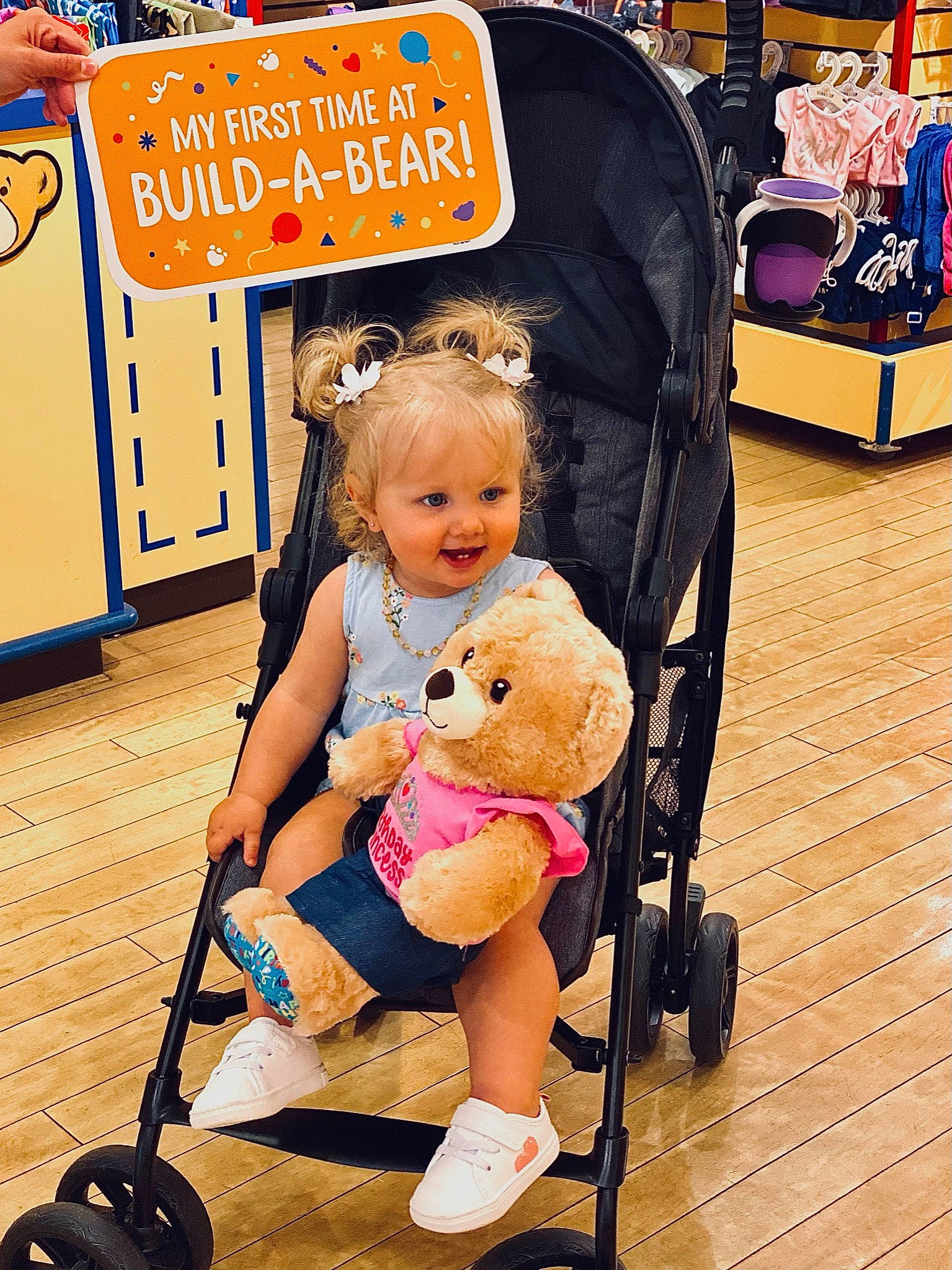 Blayklee is registered to the contest to win money with this photo: baby_toddler_clothing, beauty, child, event, flooring, fun, happy, human_leg, leisure, person, photograph, product, shoe, sitting, smile, snapshot, thigh, tire, toddler, toy