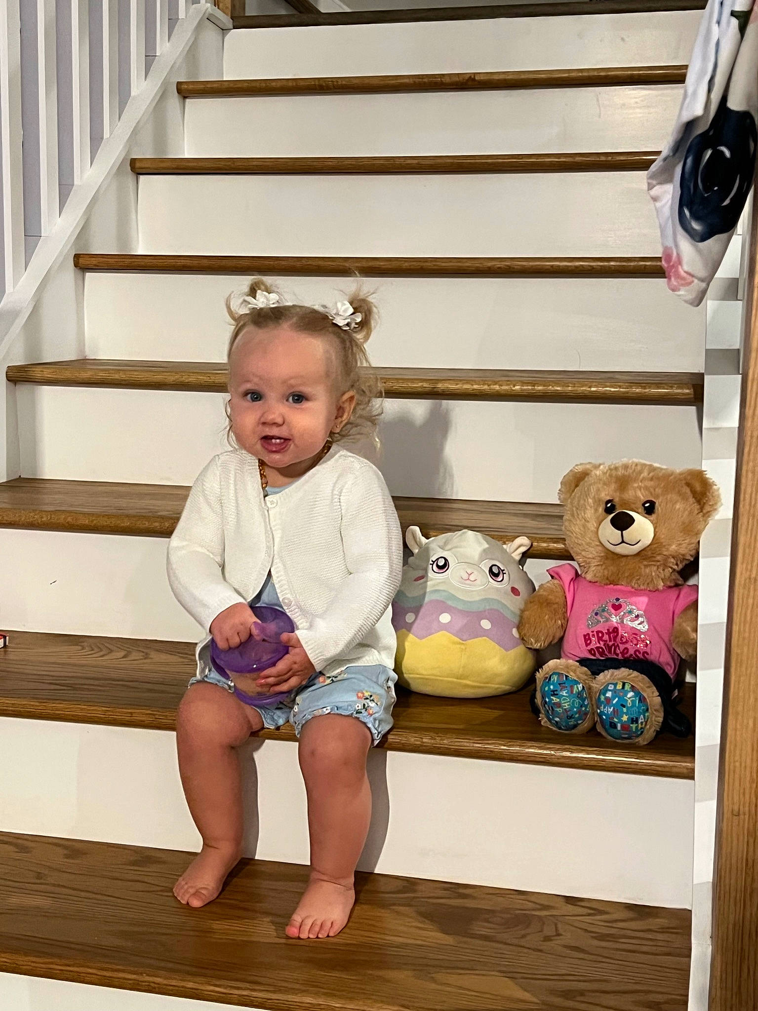 Blayklee joined the competition — help win amazing prizes! baby_toddler_clothing, barefoot, child, doll, fawn, flooring, happy, human_leg, person, pink, product, shelf, shelving, snapshot, stairs, stuffed_toy, teddy_bear, textile, thigh, toy