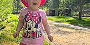 Nova is registered to the contest to win money with this photo: baby, clothing, face, grass, hat, head, land, nature, outdoors, park, person, photography, plant, portrait, shorts, summer, sunhat, tree, vegetation, woodland