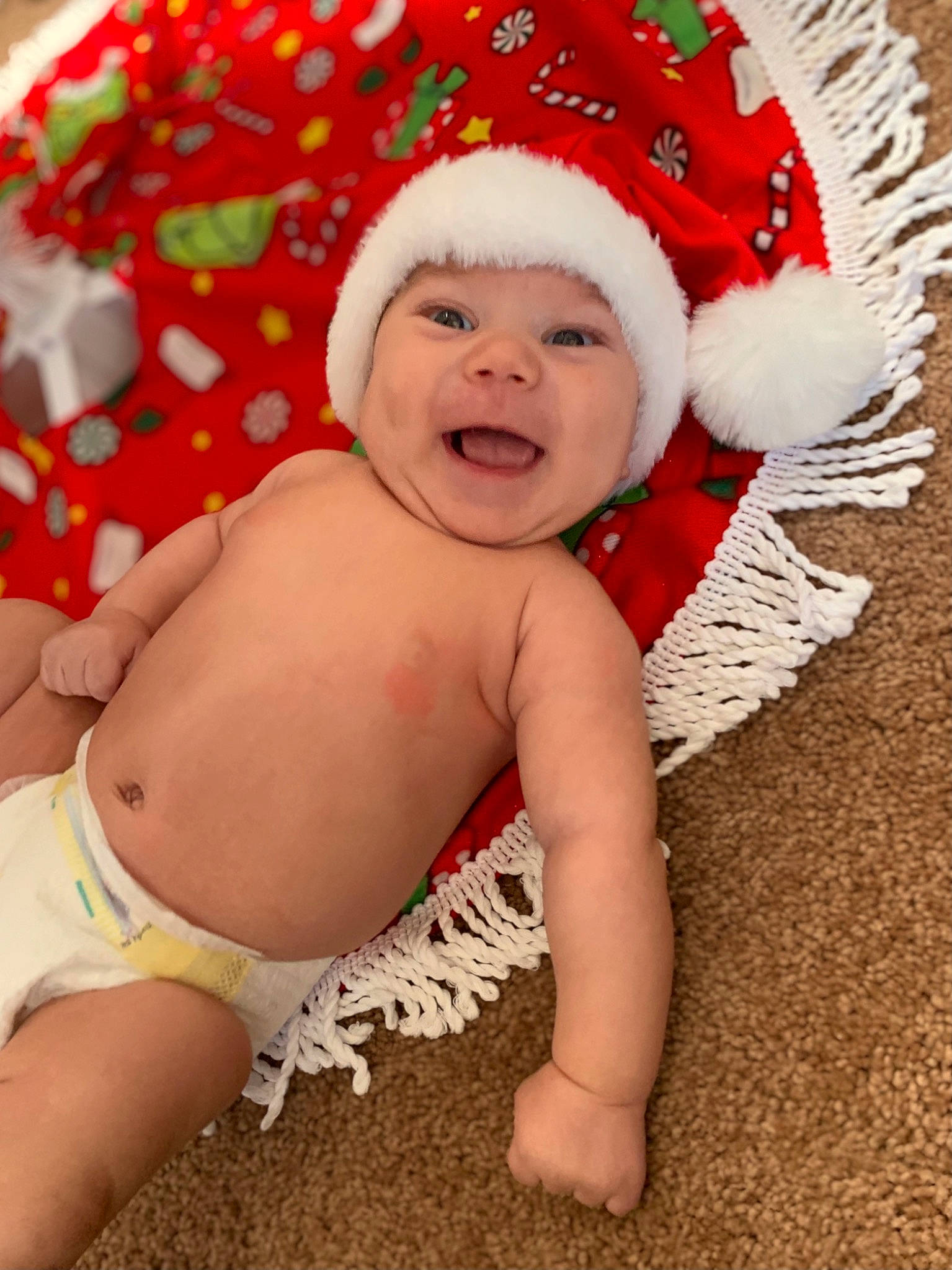 Kj joined the competition — help win amazing prizes! baby, baby_laughing, child, christmas, christmas_eve, costume_accessory, fictional_character, happy, hat, headgear, headwear, holiday, person, smile, toddler