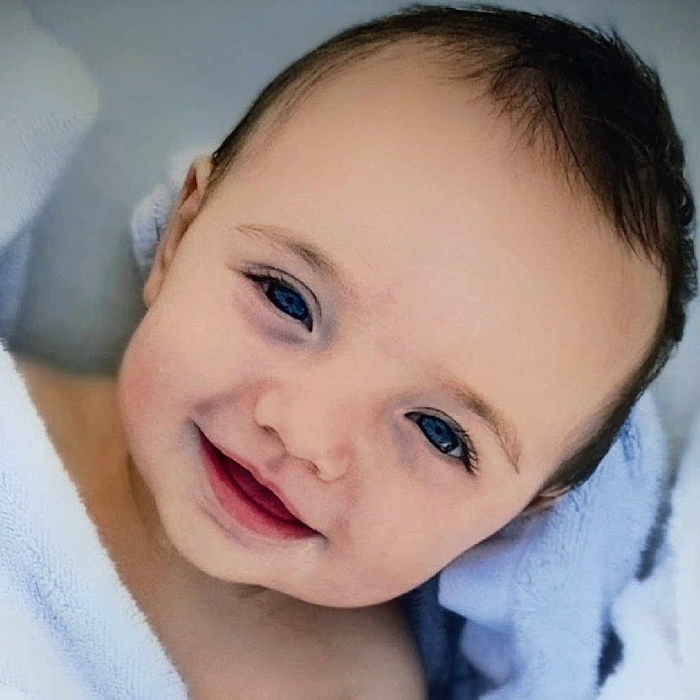 Aryez joined the competition — help win amazing prizes! baby, blanket, blue_eyes, child, close_up, cozy, cute, eyes, face, hair, happy, head, indoor, infant, photography, portrait, skin, smiling, soft_lighting, wrapped