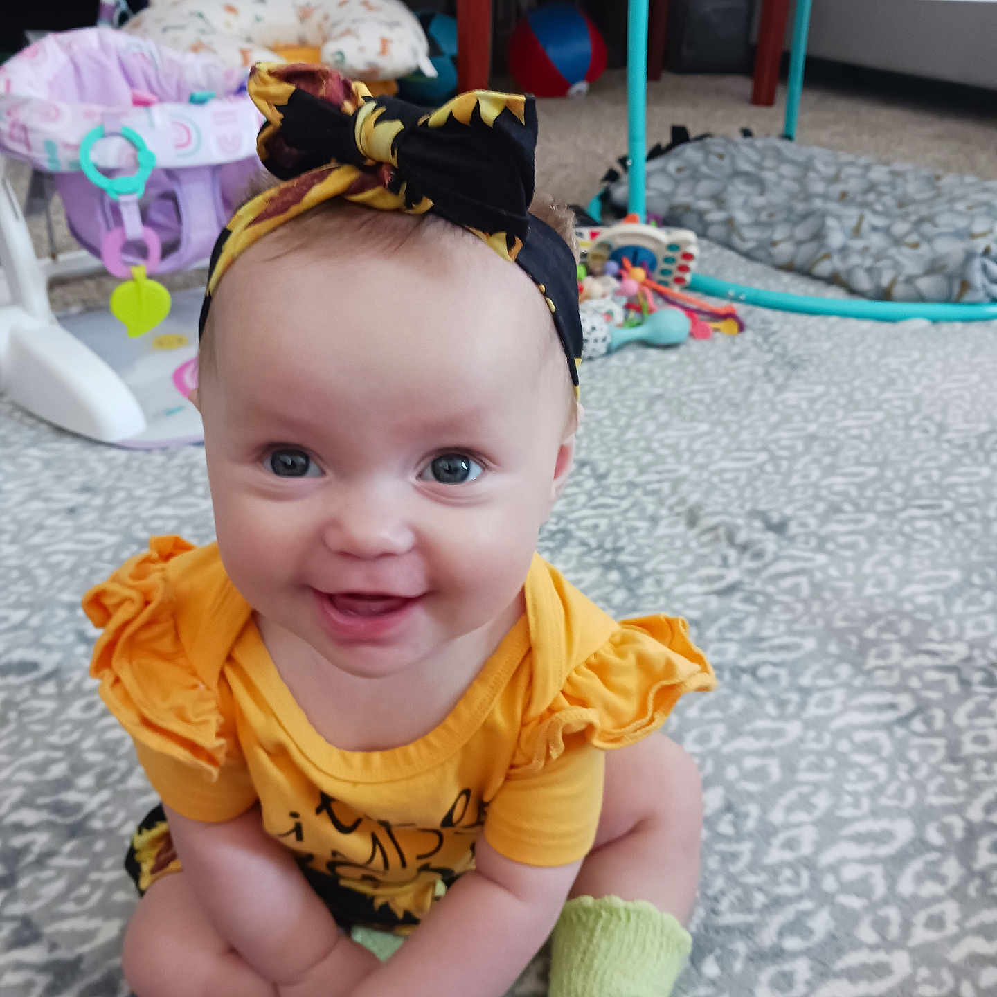 Victoria joined the competition — help win amazing prizes! baby, ball, clothing, face, footwear, furniture, happy, head, hosiery, indoors, person, photography, portrait, shoe, sitting, smile, sock, sport, volleyball, volleyballball