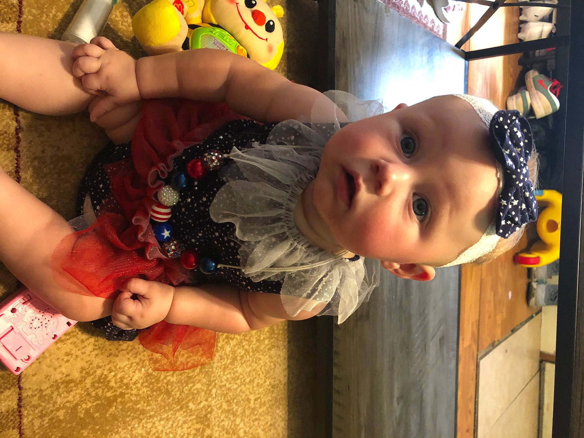 Cynthia is registered to the contest to win money with this photo: baby, cheek, child, fun, happy, head, person, photography, play, skin, smile, surprise, toddler, yellow