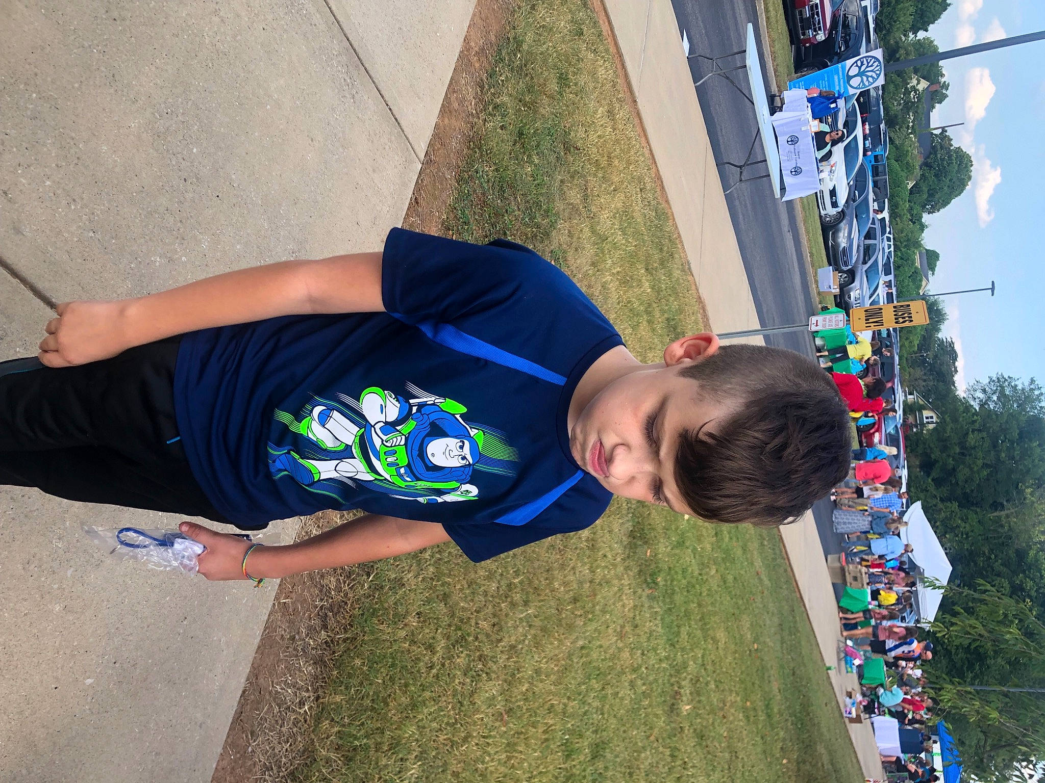 Drake joined the competition — help win amazing prizes! asphalt, child, design, elbow, electric_blue, fun, grass, hat, human_leg, joint, leisure, people_in_nature, person, recreation, sky, sleeve, t_shirt, toddler, tree, walking_shoe