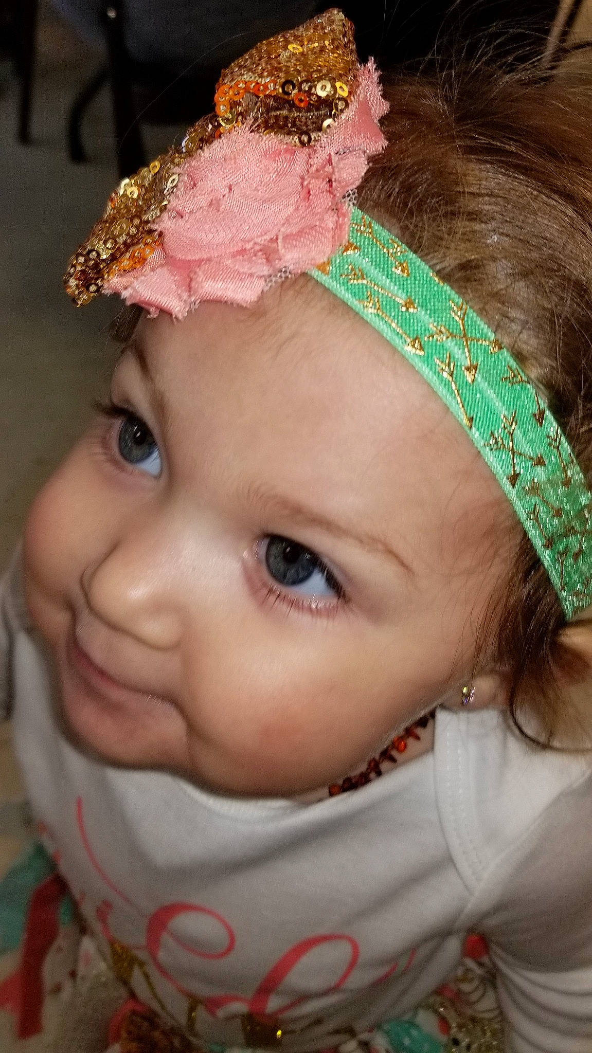 Jazmyn is registered to the contest to win money with this photo: cheek, child, eye, fashion_accessory, forehead, girl, hair_accessory, head, headband, headgear, headpiece, infant, jewellery, lip, nose, person, pink, product, skin, smile