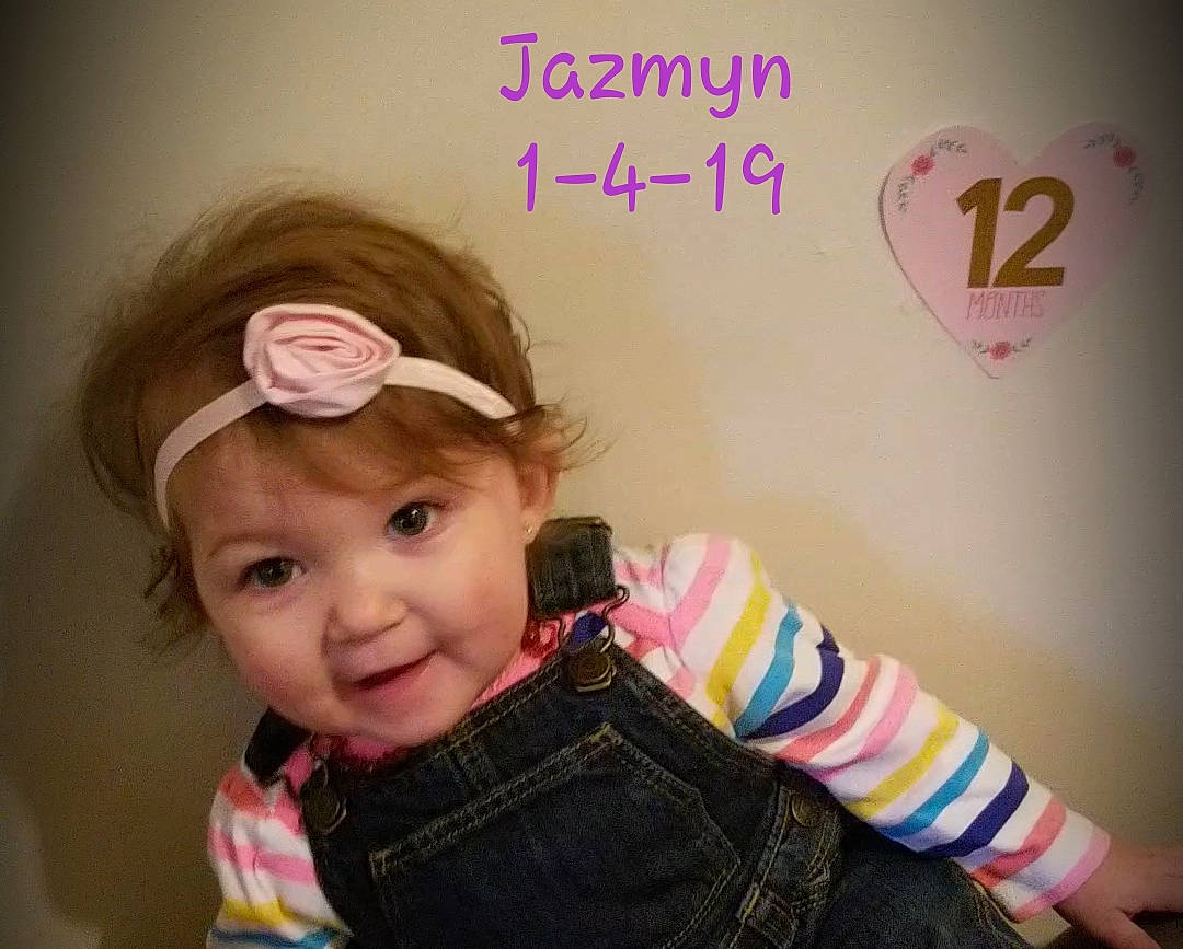 Jazmyn is registered to the contest to win money with this photo: cheek, child, cool, day, ear, eye, girl, hair_accessory, happiness, head, headband, headwear, infant, person, pink, product, skin, smile, toddler