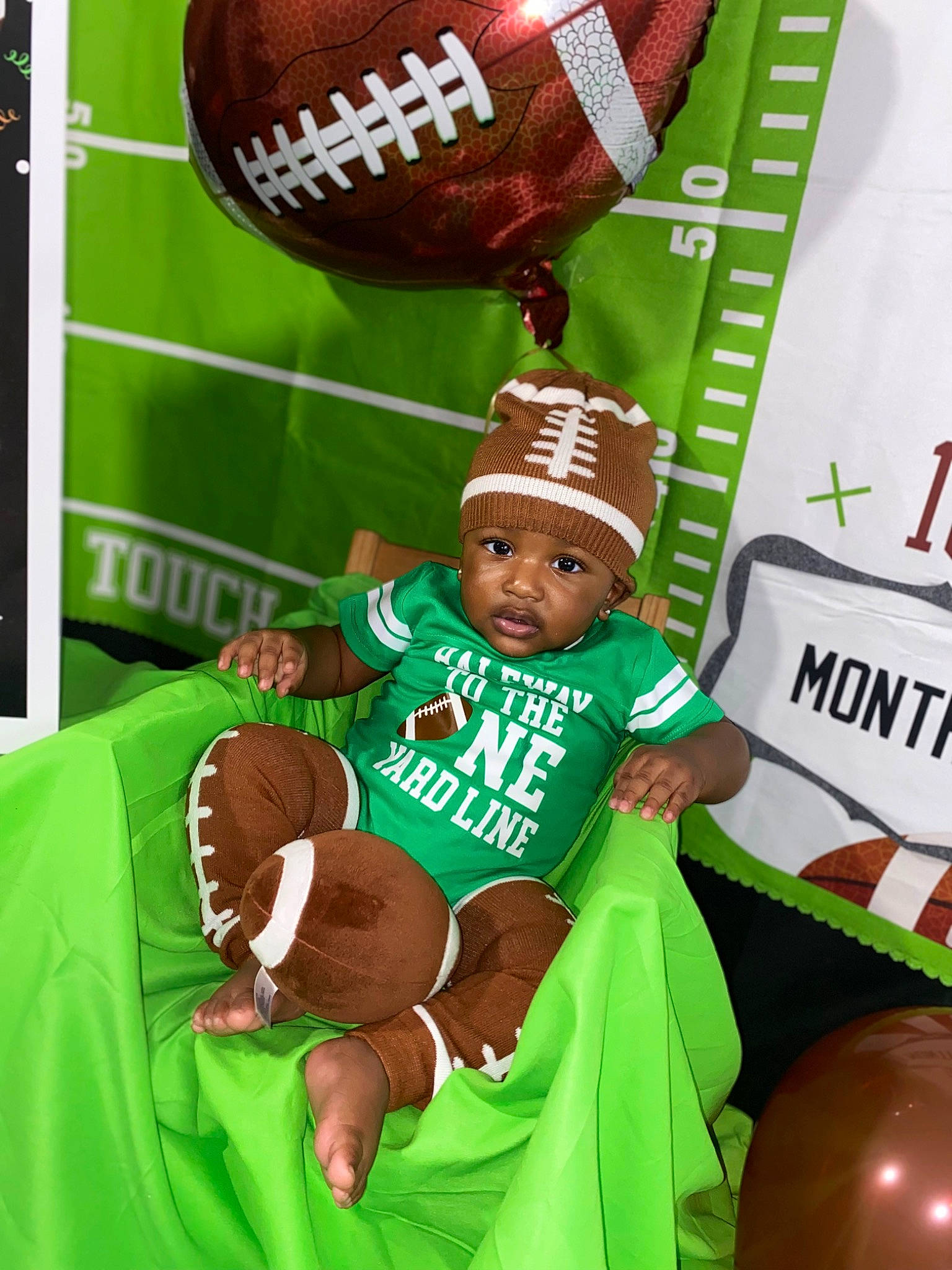 Teran is registered to the contest to win money with this photo: advertising, american_football, ball, balloon, baseball_cap, competition_event, event, fan, happy, hat, headgear, headwear, jersey, logo, person, player, sports_gear, sportswear, t_shirt, team