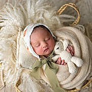 Brielle joined the competition — help win amazing prizes! baby, basket, bonnet, child, closeup, cozy, cute, fabric, floor, hand, infant, knitwear, newborn, peaceful, portrait, sleeping, soft_texture, teddy_bear, wood, wrapped