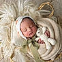 baby, basket, bonnet, child, closeup, cozy, cute, fabric, floor, hand, infant, knitwear, newborn, peaceful, portrait, sleeping, soft_texture, teddy_bear, wood, wrapped