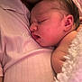 Brielle is registered to the contest to win money with this photo: newborn, baby, sleeping, infant, blanket, soft, closeup, peaceful, person, skin, face, head, pink, clothing, rest, tender, warm, comfort, child, cuddle