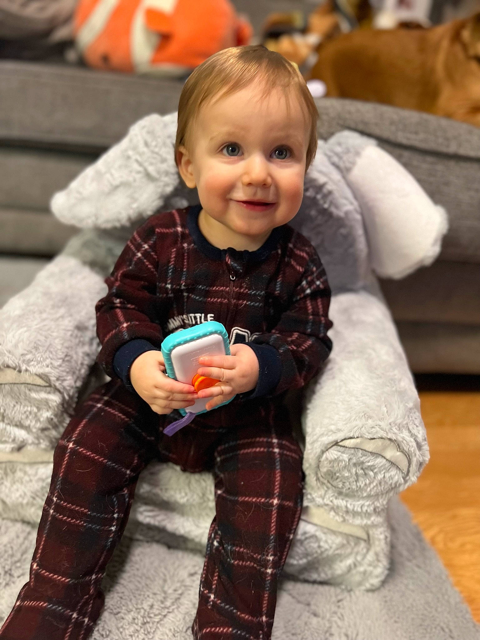 Aiden joined the competition — help win amazing prizes! baby, baby_toddler_clothing, child, comfort, eye, face, hand, happy, head, joy, leg, orange, organ, outerwear, person, skin, sleeve, smile, standing, tartan