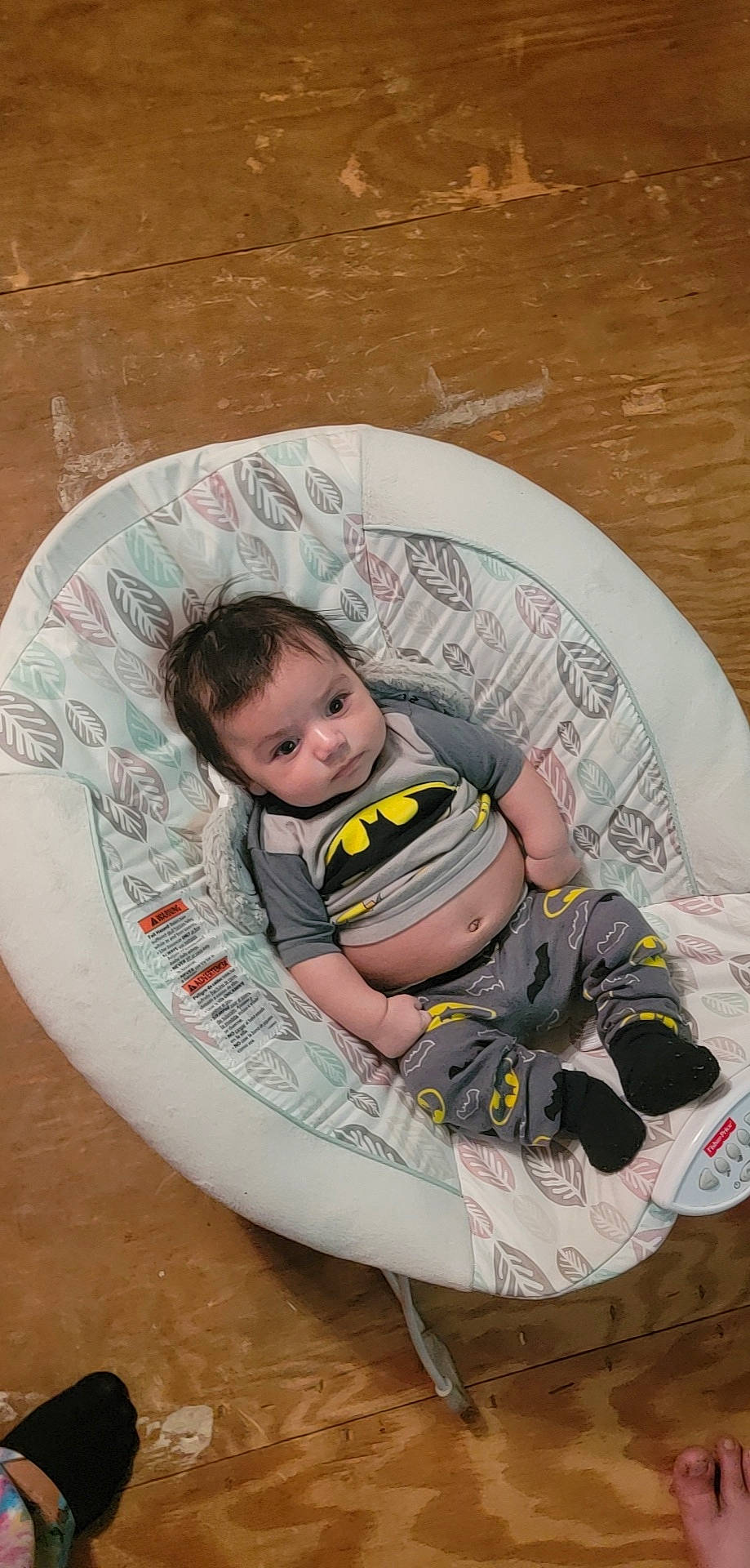 Elian is registered to the contest to win money with this photo: art, baby, baby_products, baby_toddler_clothing, chair, child, circle, comfort, flooring, fun, happy, pattern, person, personal_protective_equipment, play, recreation, sitting, smile, t_shirt, toddler