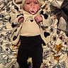 Bellamy joined the competition — help win amazing prizes! baby, infant, pacifier, headband, jacket, floral_blanket, blanket, clothing, cute, lying_down, indoors, person, face, pink, black_pants, pattern, soft, warm_clothing, newborn, baby_girl