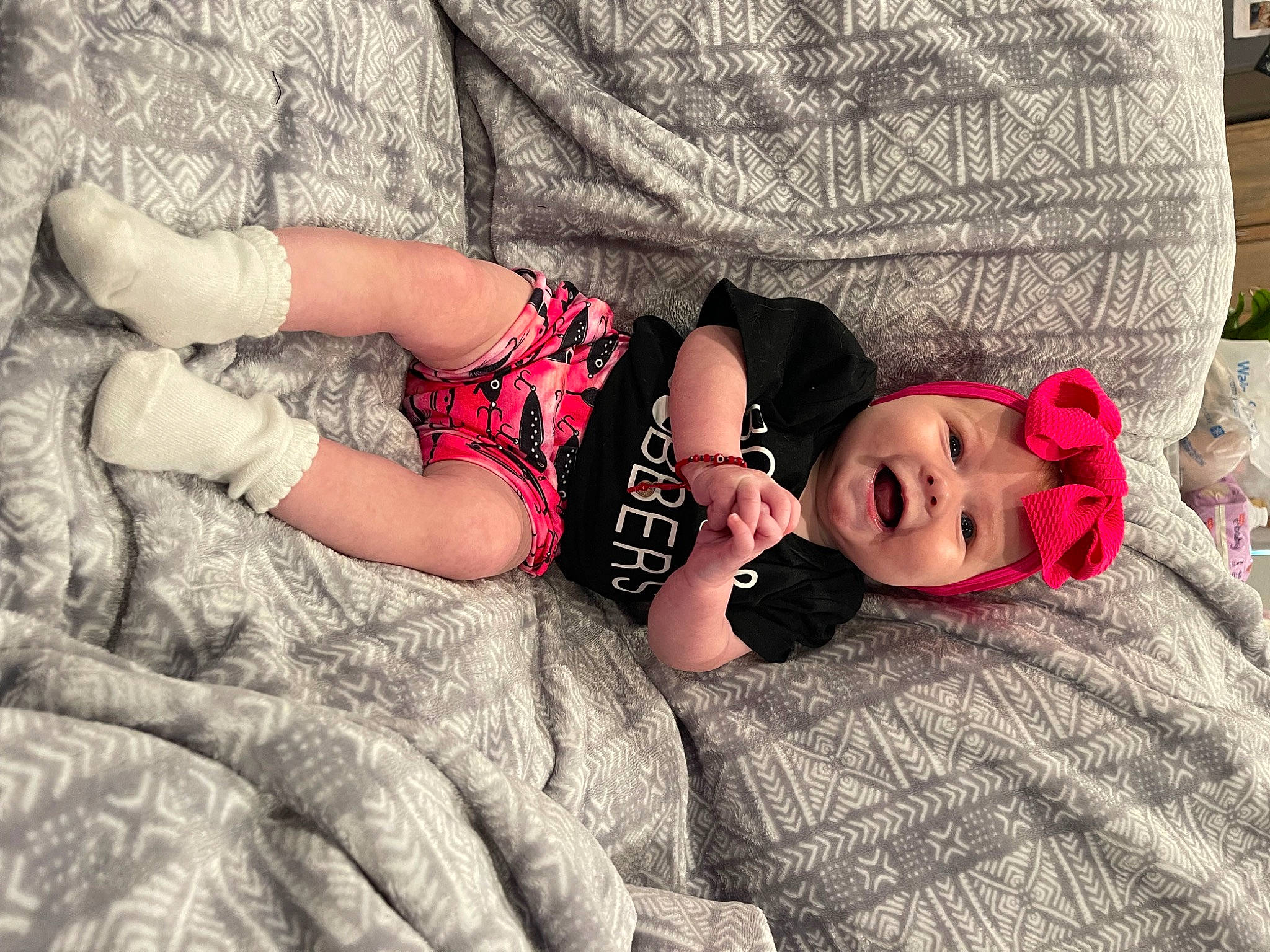 Ensley is registered to the contest to win money with this photo: comfort, doll, dress, eye, fashion, fawn, finger, glasses, hand, hat, head, headwear, human_body, leg, person, pink, skin, textile, thigh, toy