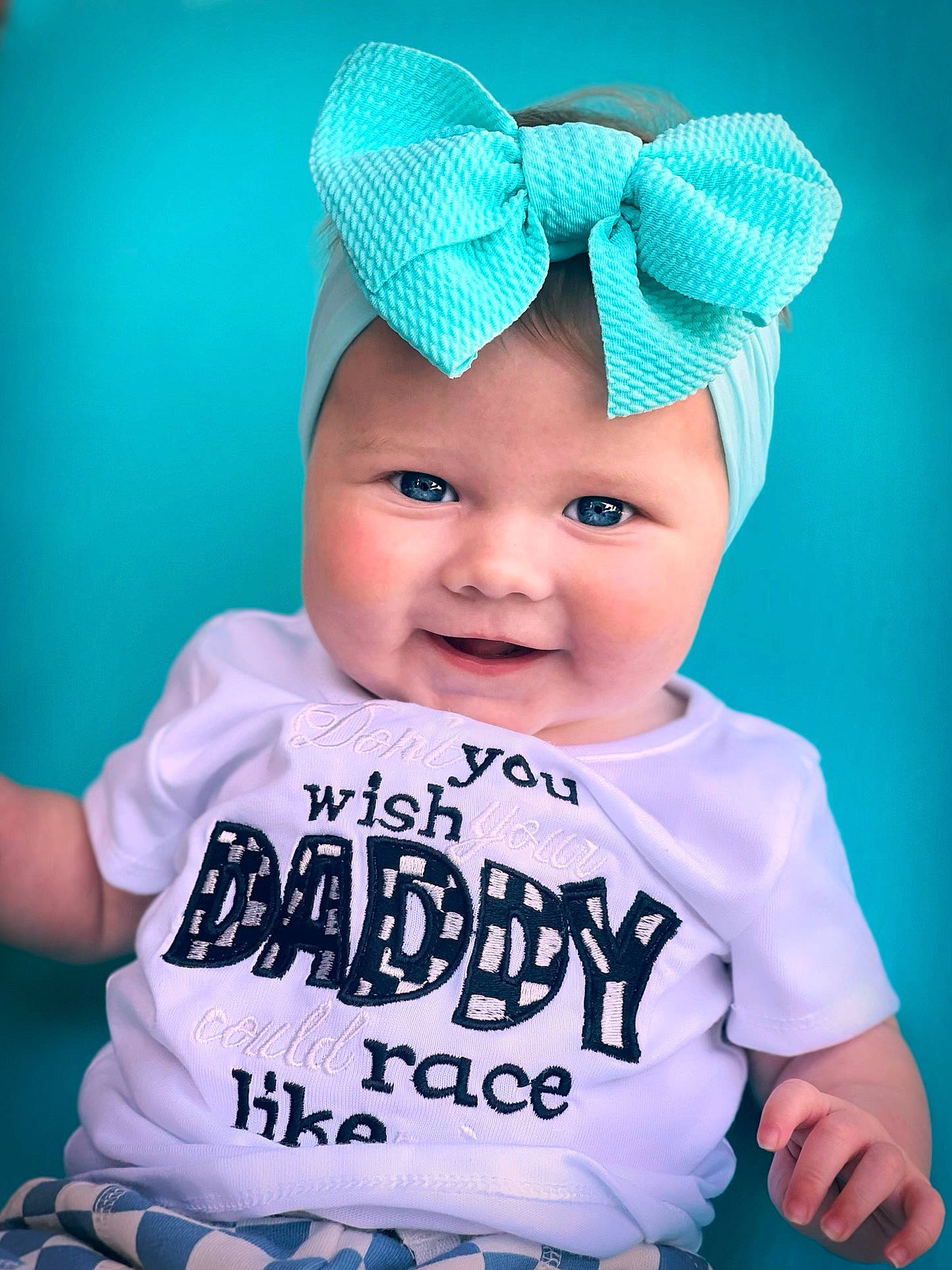 Ensley is registered to the contest to win money with this photo: aqua, baby, baby_toddler_clothing, blue, cap, child, cool, costume_hat, happy, hat, headgear, headwear, joy, magenta, person, pink, product, purple, sleeve, smile