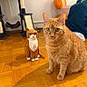 animal, cat, cat_tree, cozy, ears, eyes, feline, flooring, home, household, indoor, lego_cat, orange_cat, orange_fur, parquet_floor, pet, sitting, tabby_cat, toy, whiskers