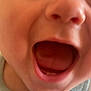 Jameson is registered to the contest to win money with this photo: baby, close_up, mouth_open, joyful, child, face, skin, blue_clothing, infant, expression, tongue, teeth, cheeks, human, portrait, cute, happy, young, smile, head