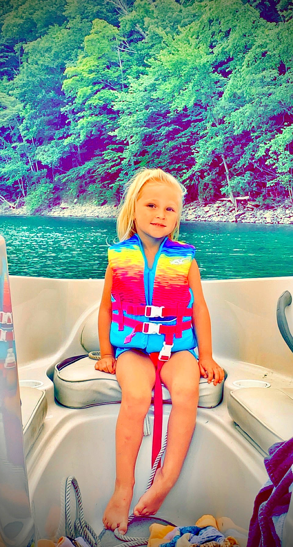 Haileigh is registered to the contest to win money with this photo: aqua, automotive_design, beauty, boat, boats_and_boating_equipment_and_supplies, body_of_water, electric_blue, fun, happy, joy, leisure, outdoor_recreation, person, photograph, recreation, swimwear, thigh, travel, tree, vehicle