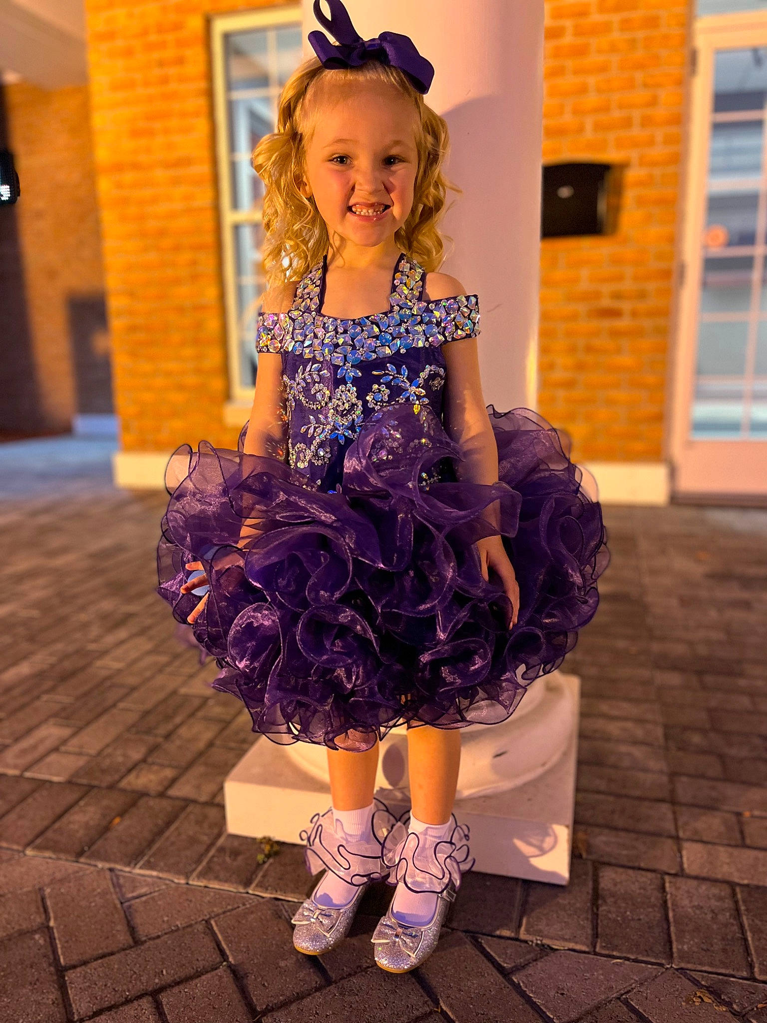 Haileigh is registered to the contest to win money with this photo: baby_toddler_clothing, blond, day_dress, dress, electric_blue, embellishment, event, fashion_design, formal_wear, hair, happy, headpiece, iris, joy, magenta, one_piece_garment, person, pink, purple, smile