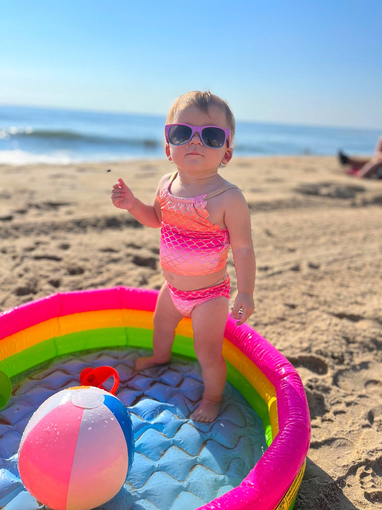 Emerleigh joined the competition — help win amazing prizes! automotive_tire, azure, beach, eyewear, fun, goggles, happy, leisure, morning, people_on_beach, person, photograph, pink, recreation, sky, summer, sunglasses, swimwear, toddler, vertebrate