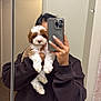 bathroom, brown, curtain, cute, dog, fur, hand, holding, indoor, mirror, mirror_selfie, nail_polish, person, pet, phone, puppy, reflection, selfie, sweatshirt, white