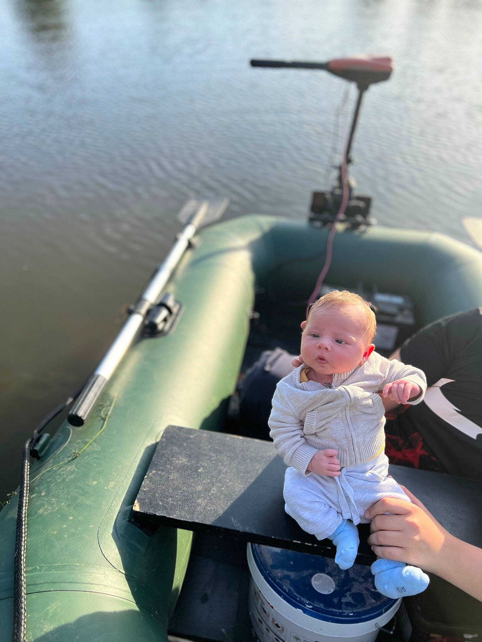 Lewys participe au concours pour gagner de l'argent avec cette photo : arm, baby, baby_carriage, baby_products, boat, boats_and_boating_equipment_and_supplies, child, fun, lake, lap, leisure, motor_vehicle, person, recreation, sitting, toddler, travel, vehicle, water, water_transportation